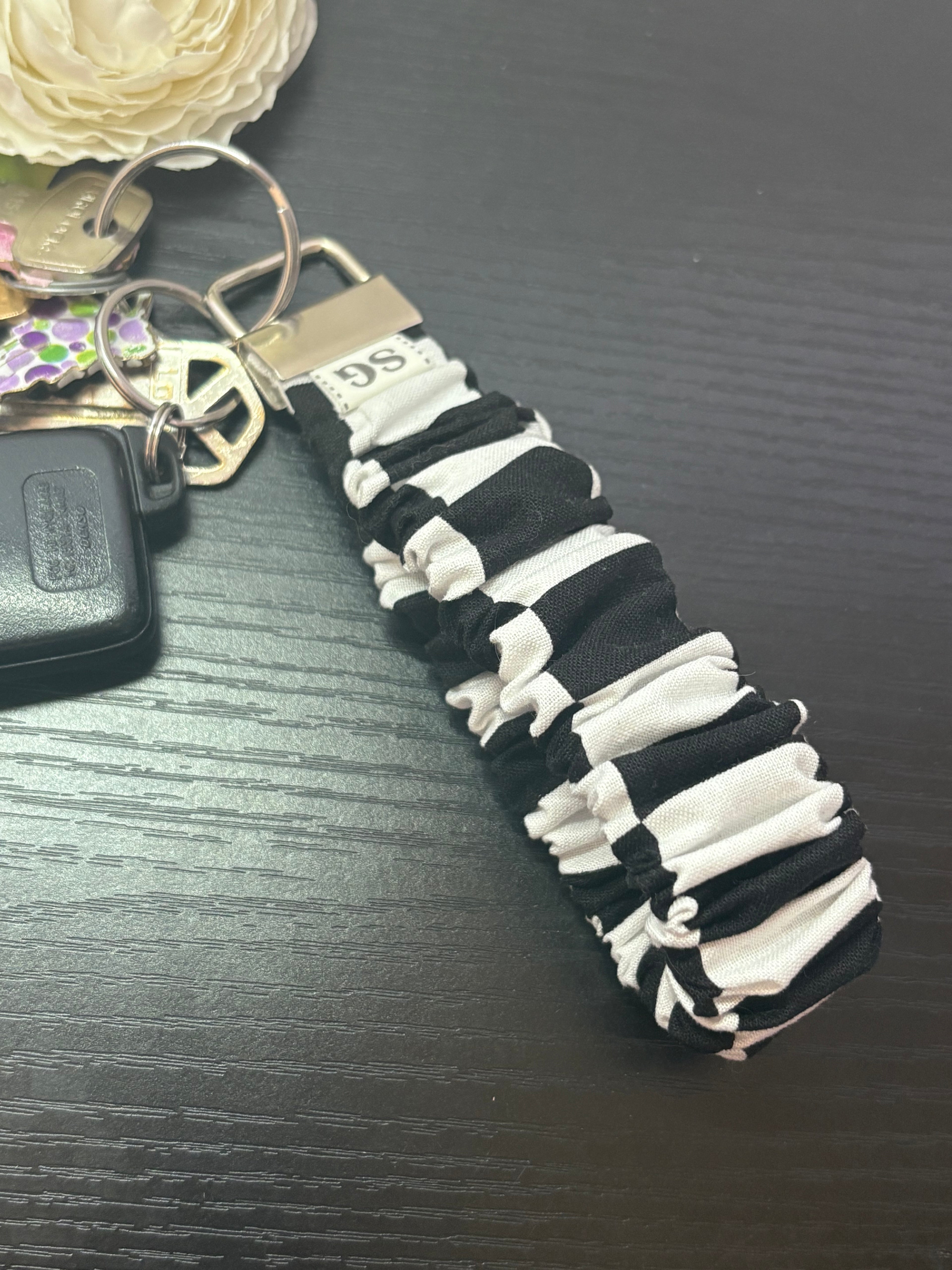 Black and white checkered scrunchie wristlet