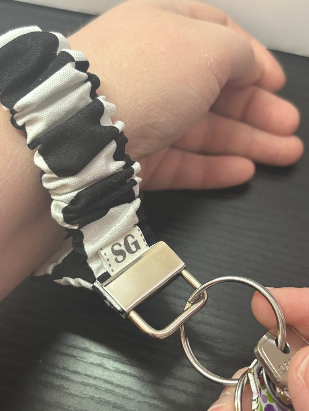 Black and white checkered scrunchie wristlet