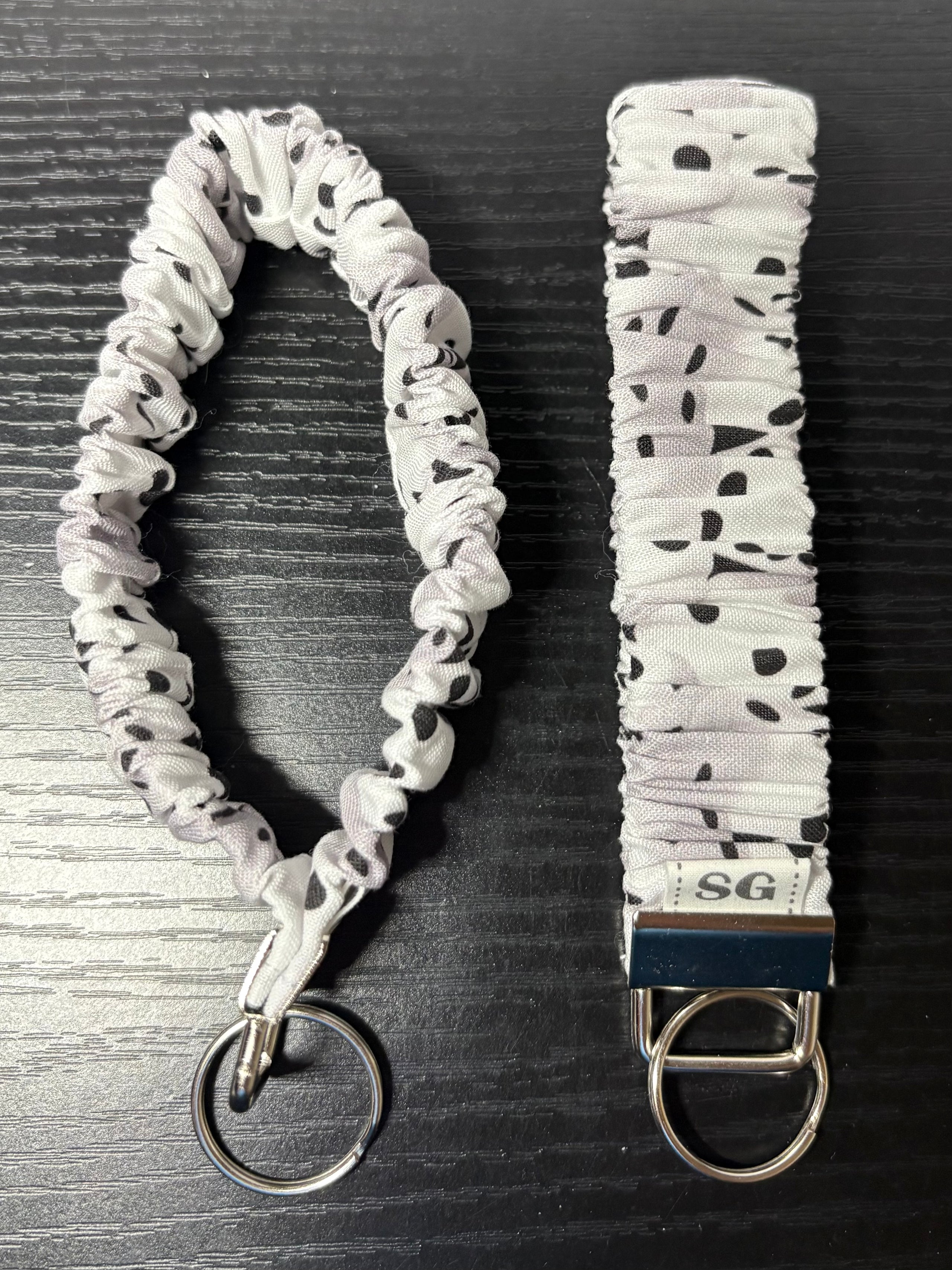 Black and white dice pattern scrunchie wristlet
