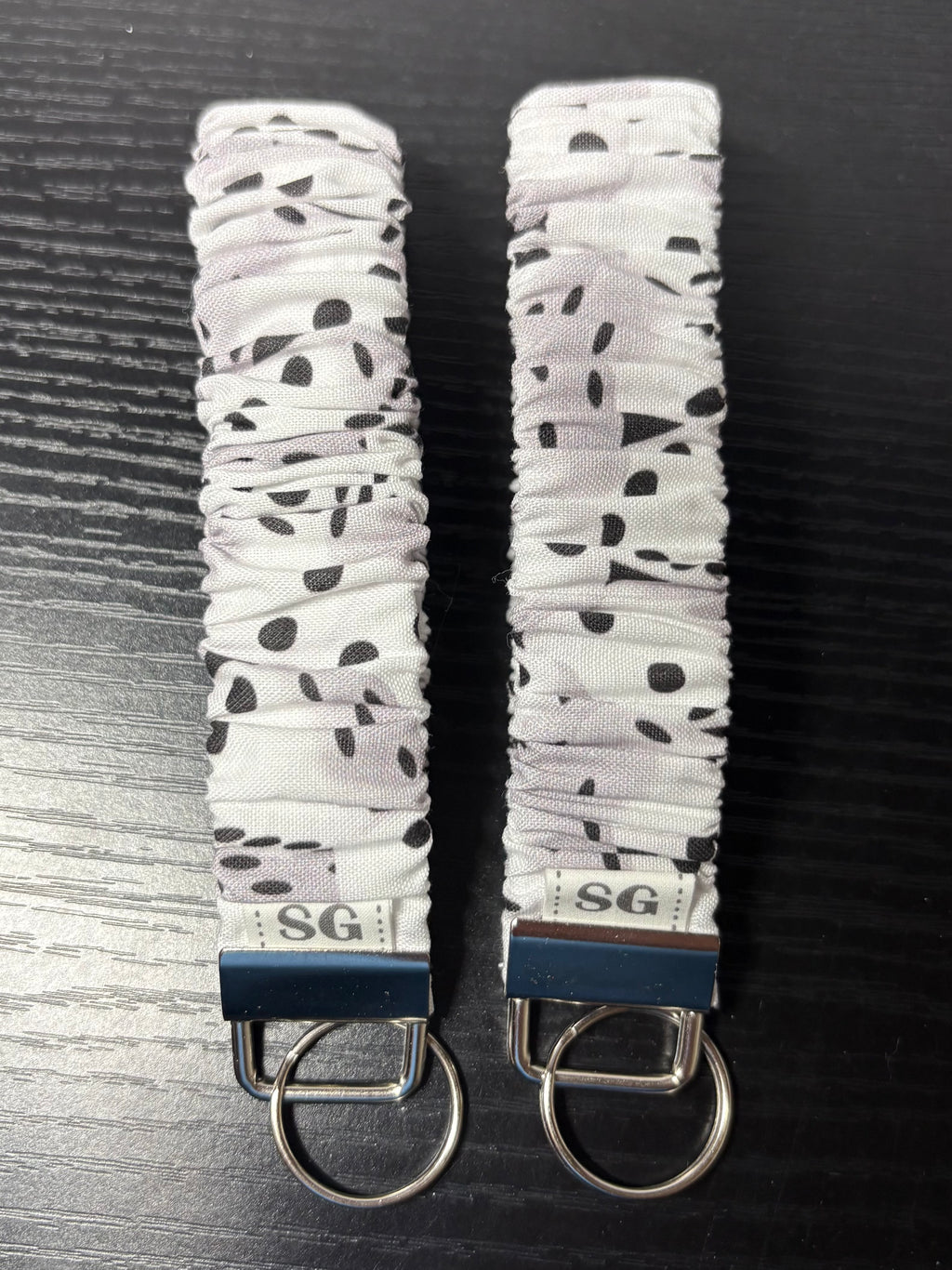 Black and white dice pattern scrunchie wristlet