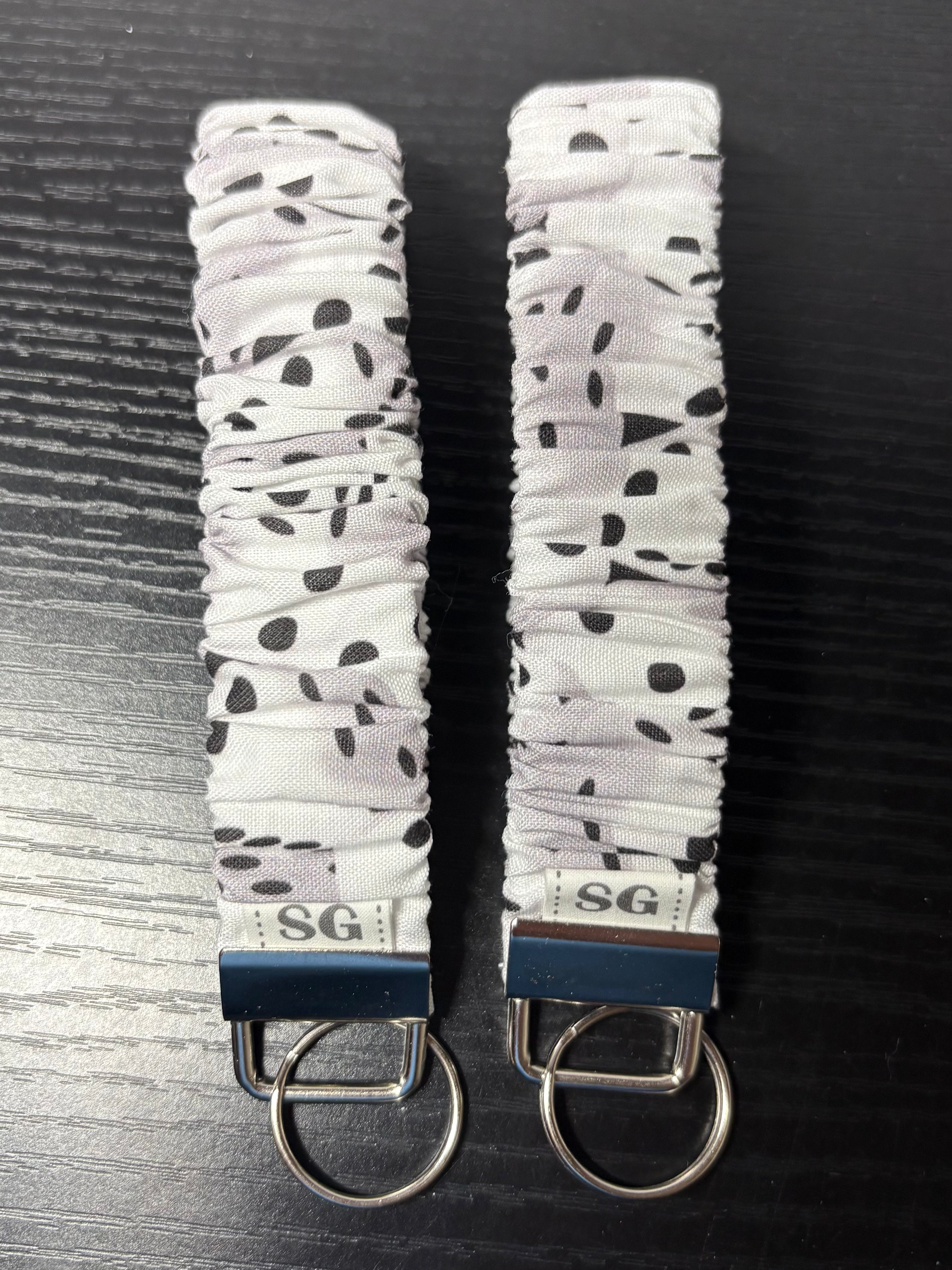 Black and white dice pattern scrunchie wristlet