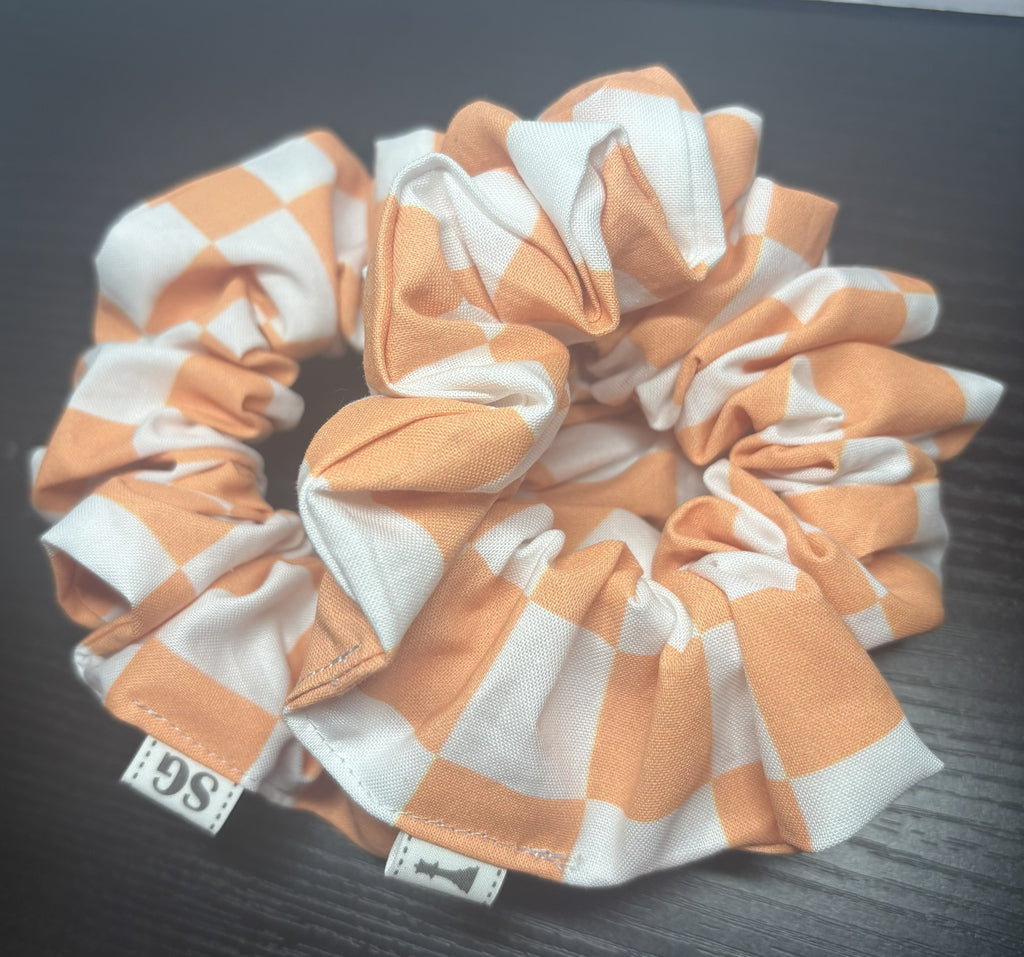 Orange and white checkered hair scrunchie