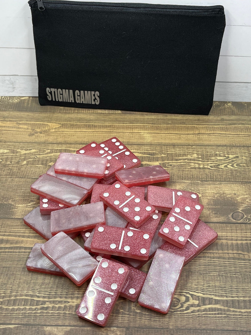 Pink and white handmade resin Dominoes.