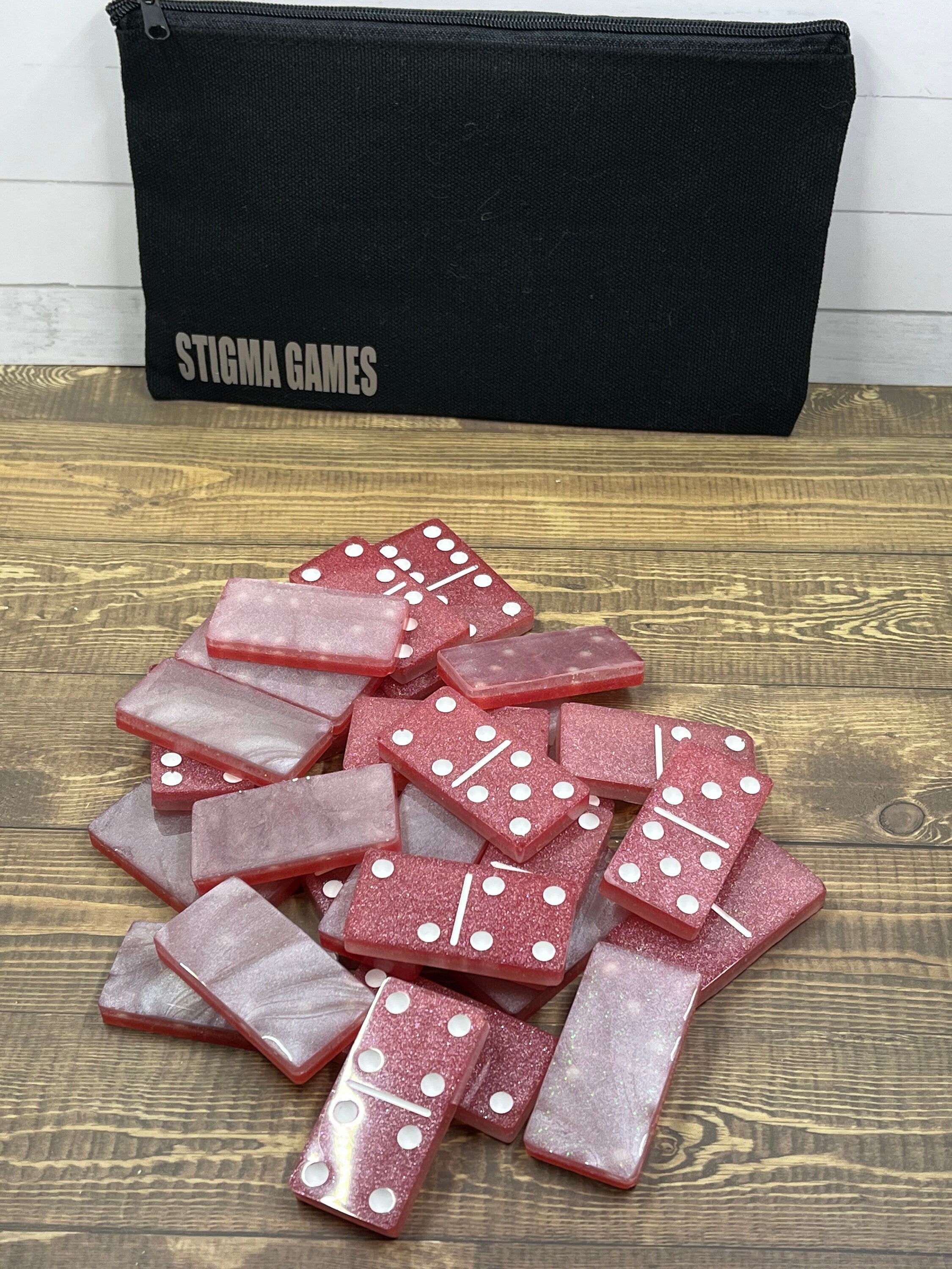 Pink and white handmade resin Dominoes.