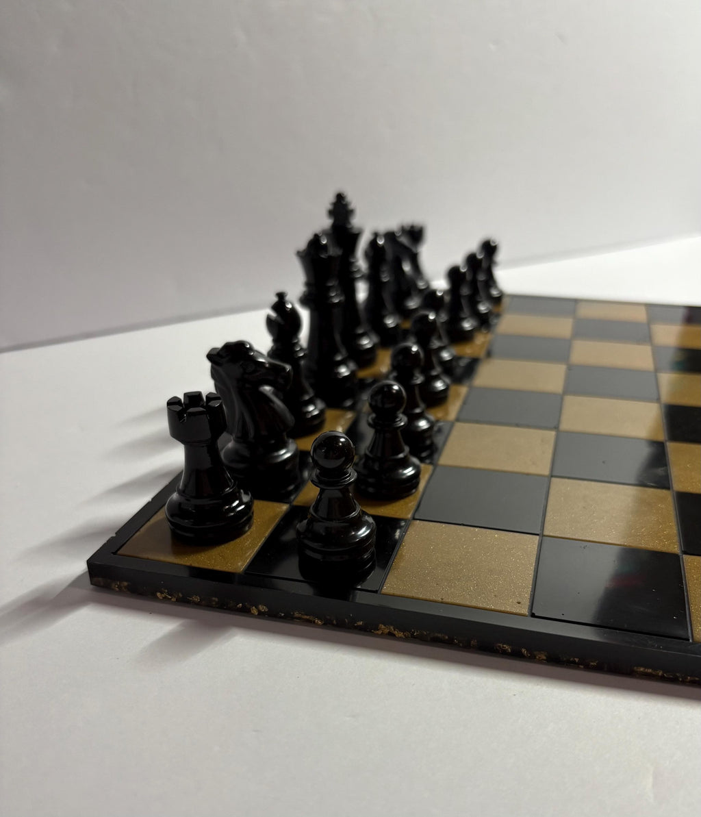 Black and gold handmade resin chess set.