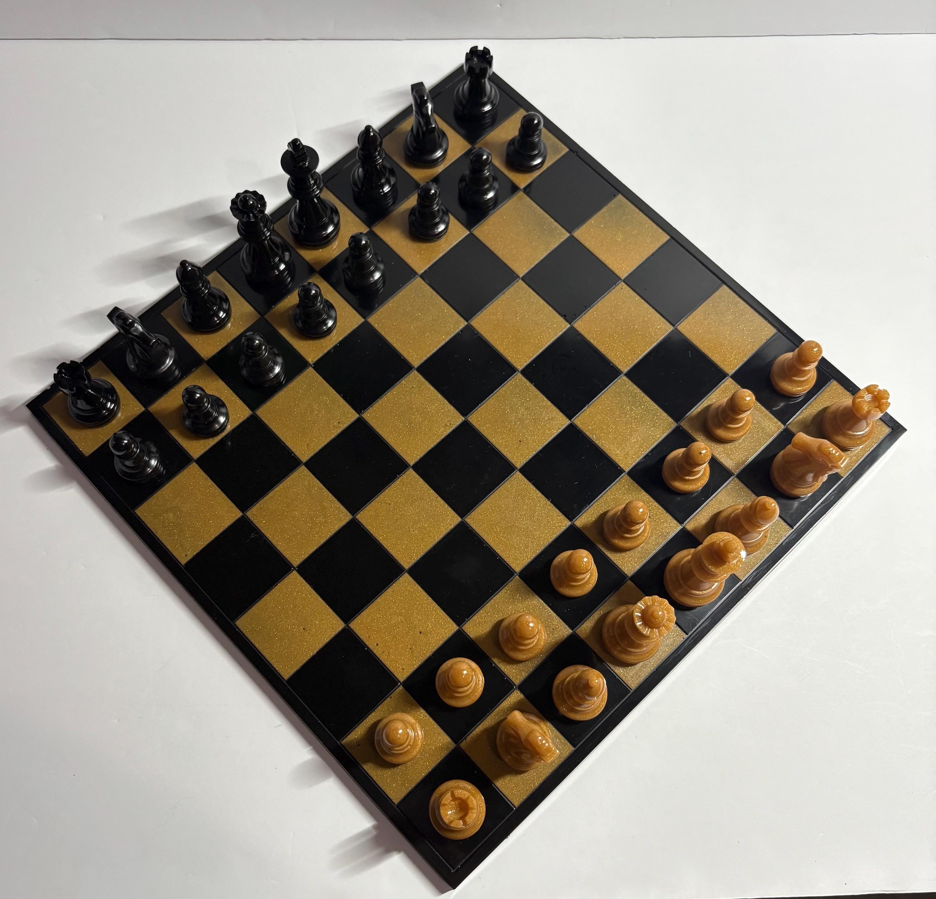Black and gold handmade resin chess set.