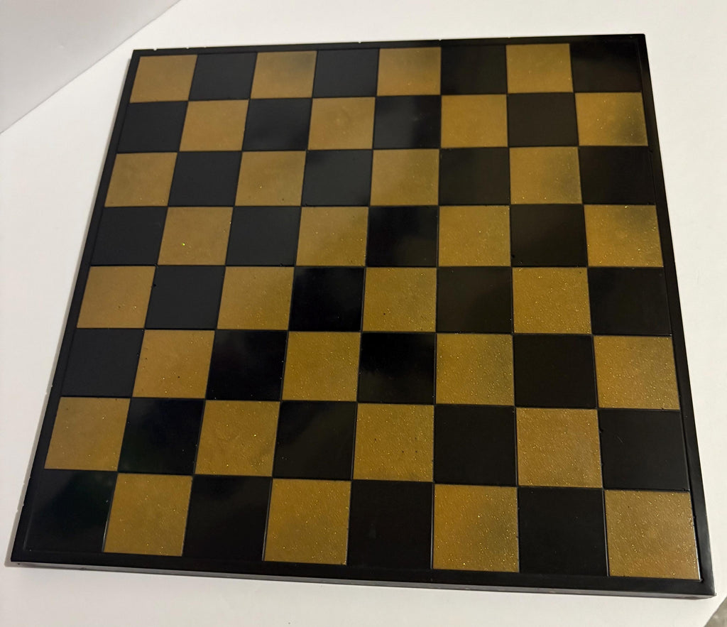 Black and gold handmade resin chess set.